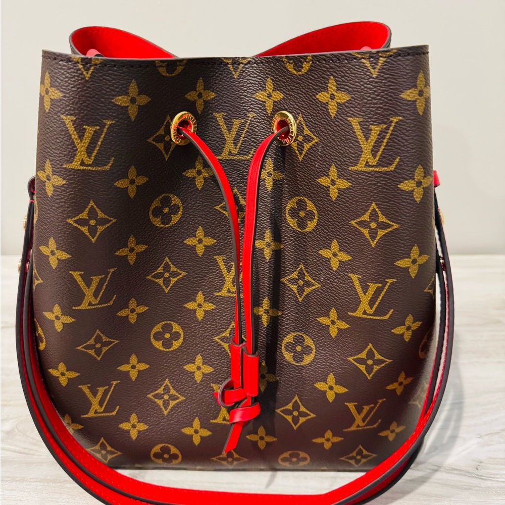 Louis Vuitton Bucket Bag. Comes with box, authenticity card and everything